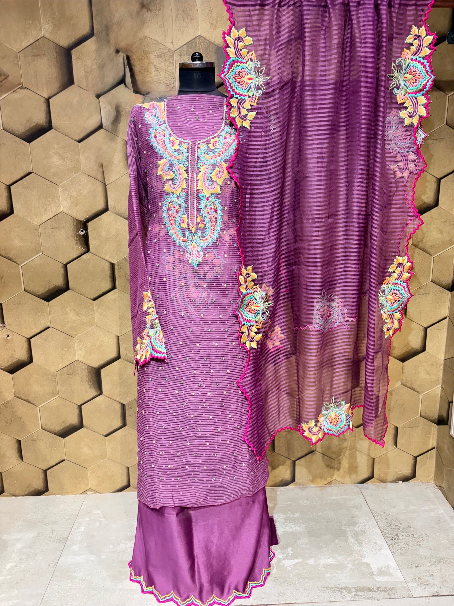 Exclusive handcrafted ensemble in Mul Chanderi with multi coloured embroidery