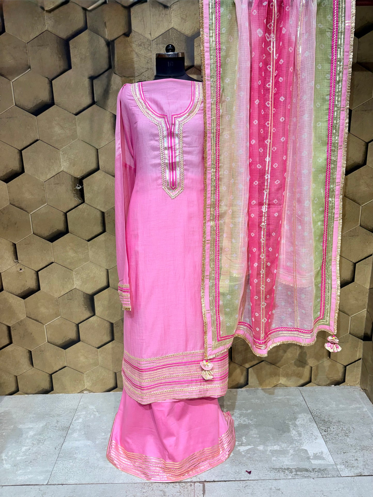 Graceful Mul Chanderi suit set in a beautiful muted pink hue with Laces and Gotta detailings