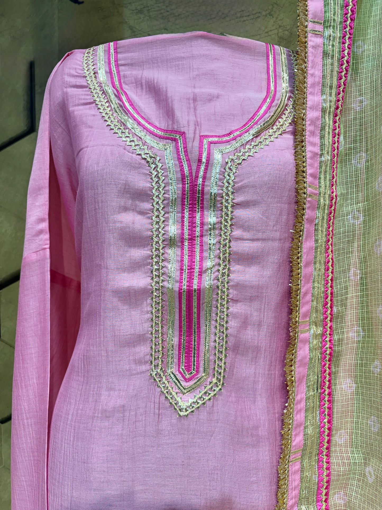 Graceful Mul Chanderi suit set in a beautiful muted pink hue with Laces and Gotta detailings
