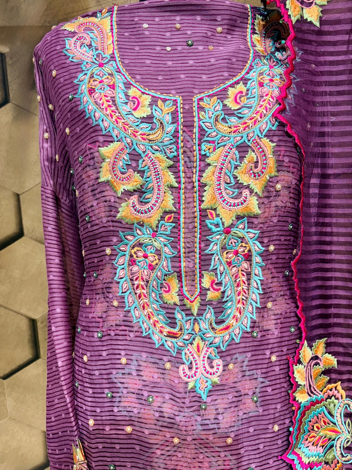 Exclusive handcrafted ensemble in Mul Chanderi with multi coloured embroidery