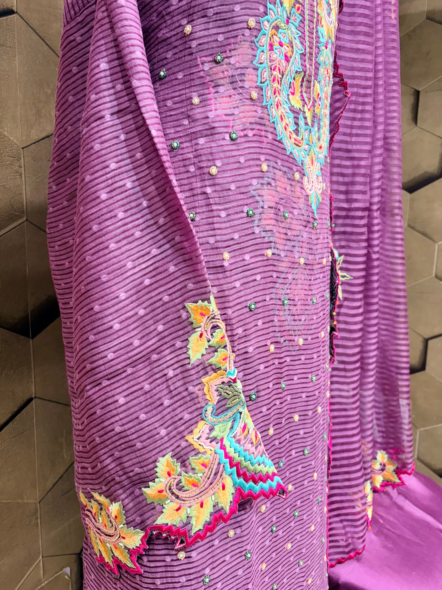 Exclusive handcrafted ensemble in Mul Chanderi with multi coloured embroidery