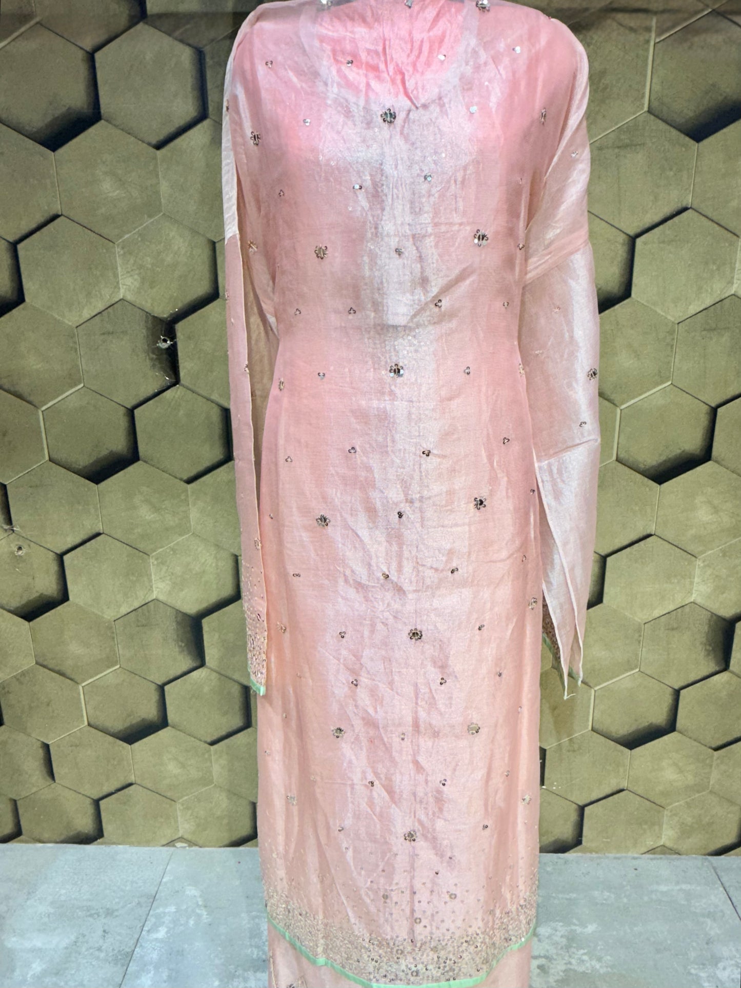 Elegant soft peach tissue with zari and intricate sequins embroidery