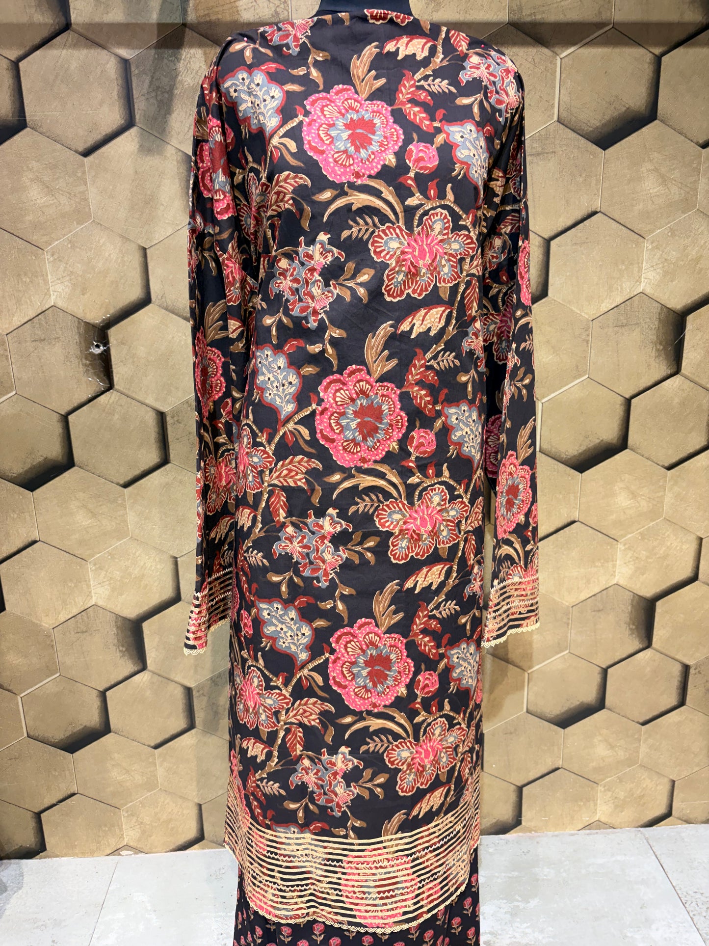Pure cotton suit set in a timeless black shade with gotta detailings