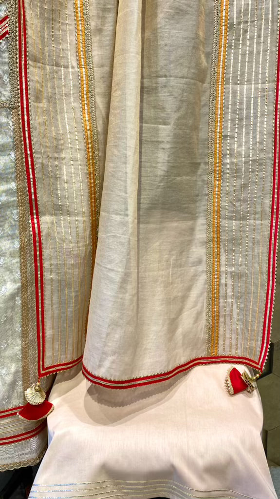 Chanderi tissue outfit with a hint of red