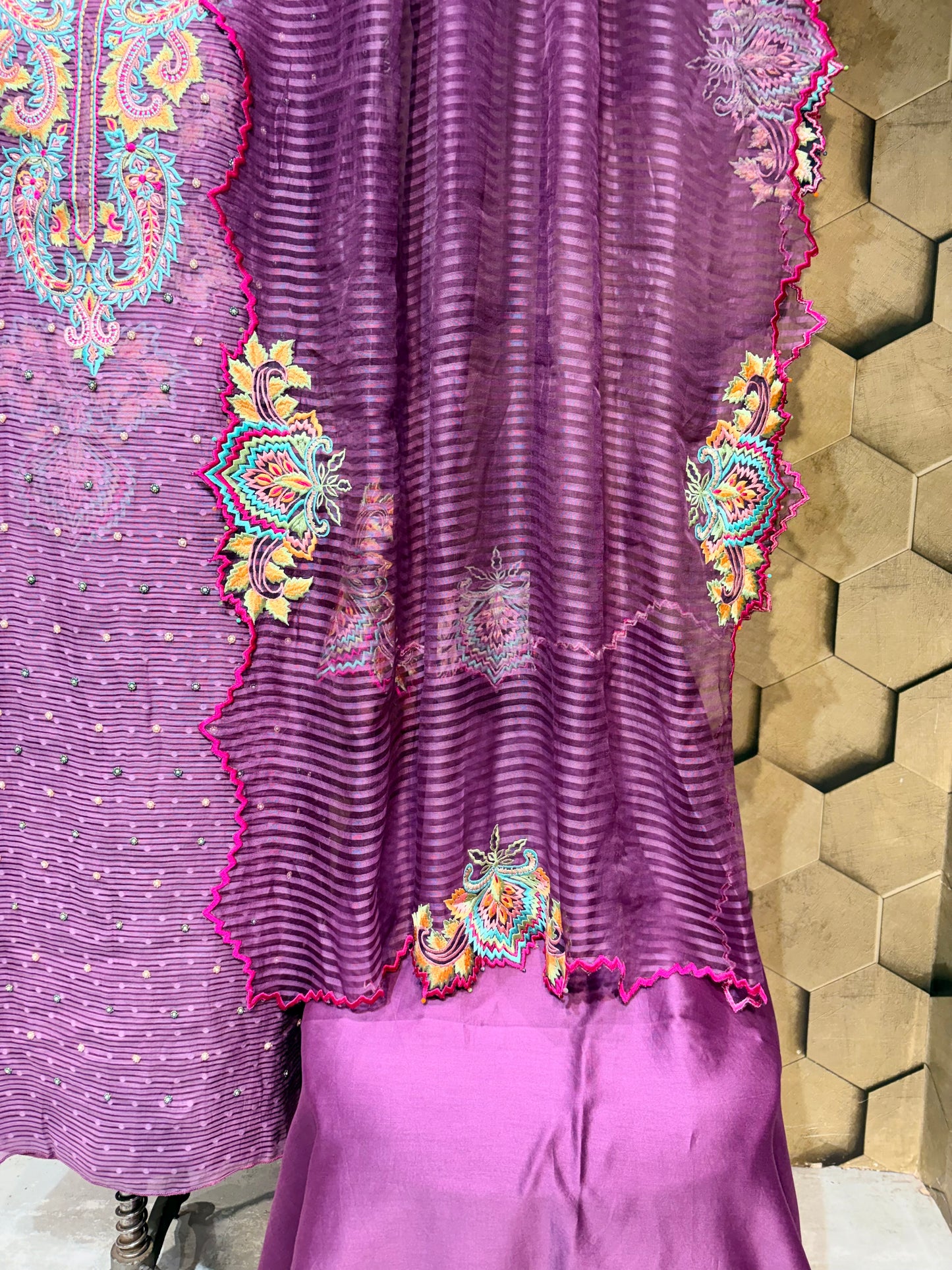 Exclusive handcrafted ensemble in Mul Chanderi with multi coloured embroidery
