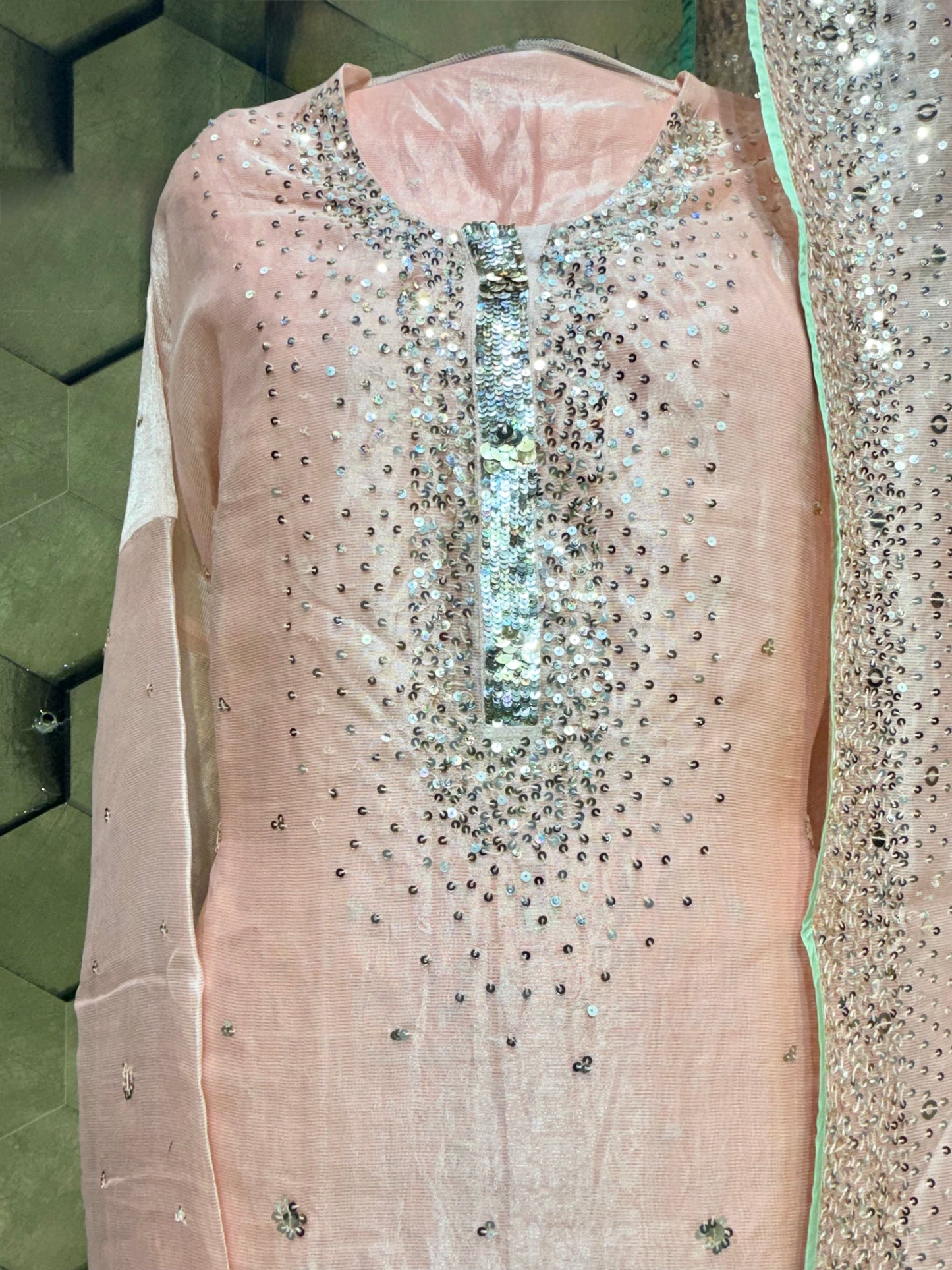 Elegant soft peach tissue with zari and intricate sequins embroidery