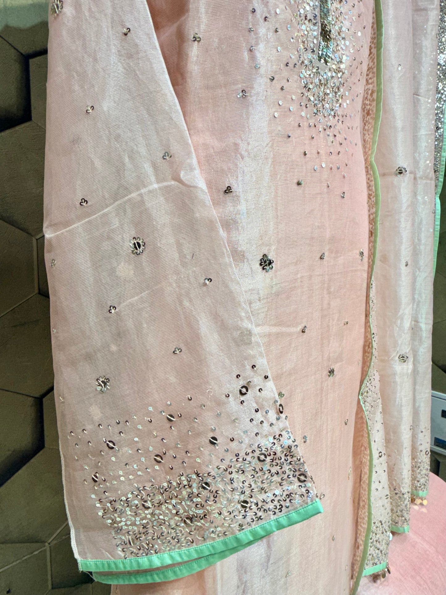 Elegant soft peach tissue with zari and intricate sequins embroidery