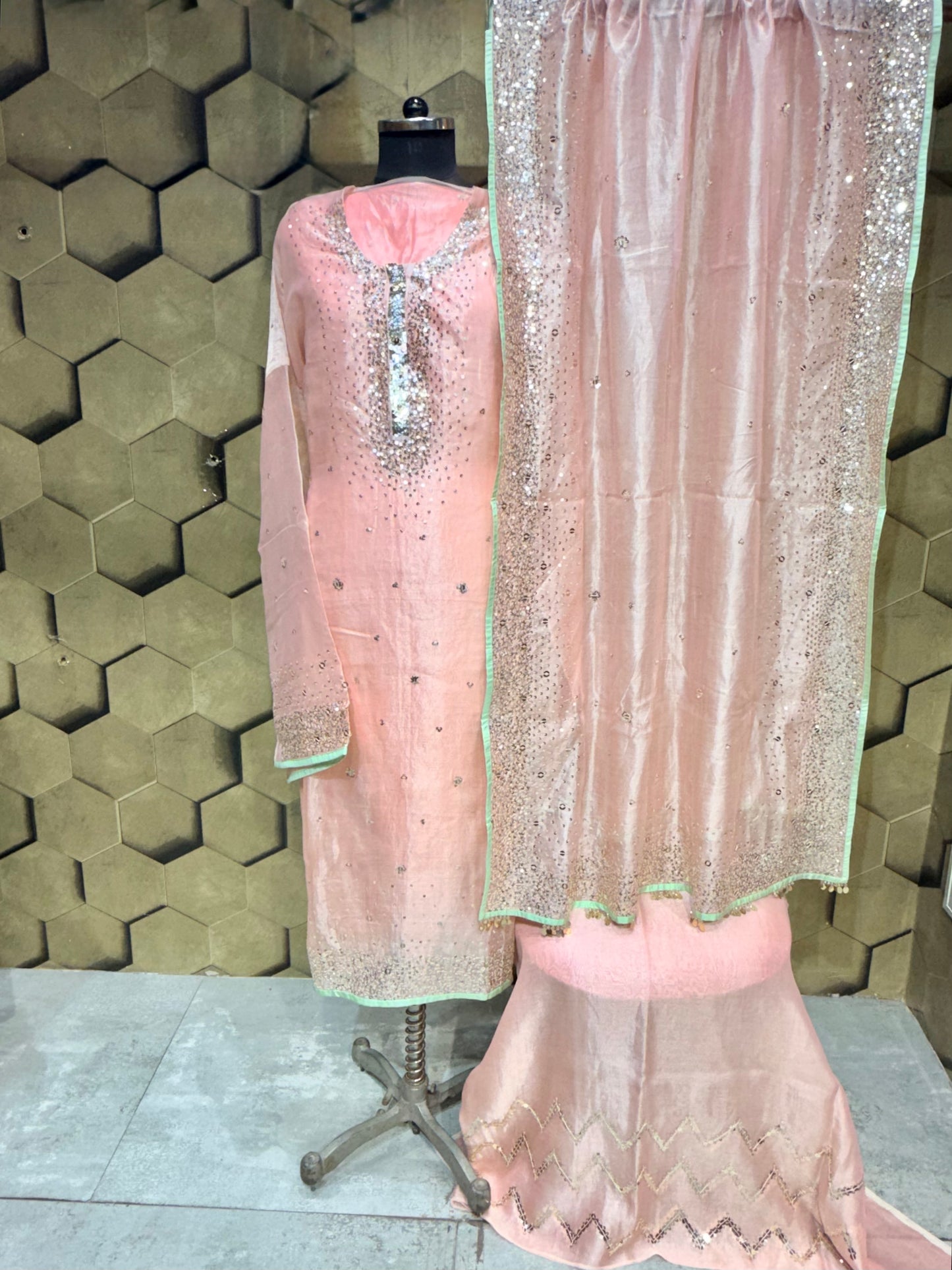 Elegant soft peach tissue with zari and intricate sequins embroidery
