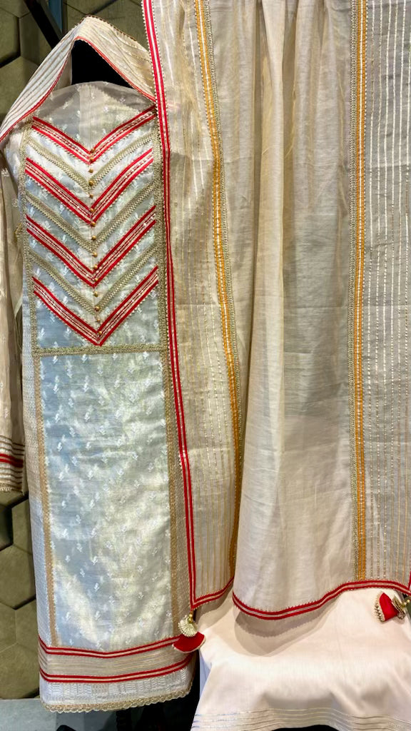 Chanderi tissue outfit with a hint of red