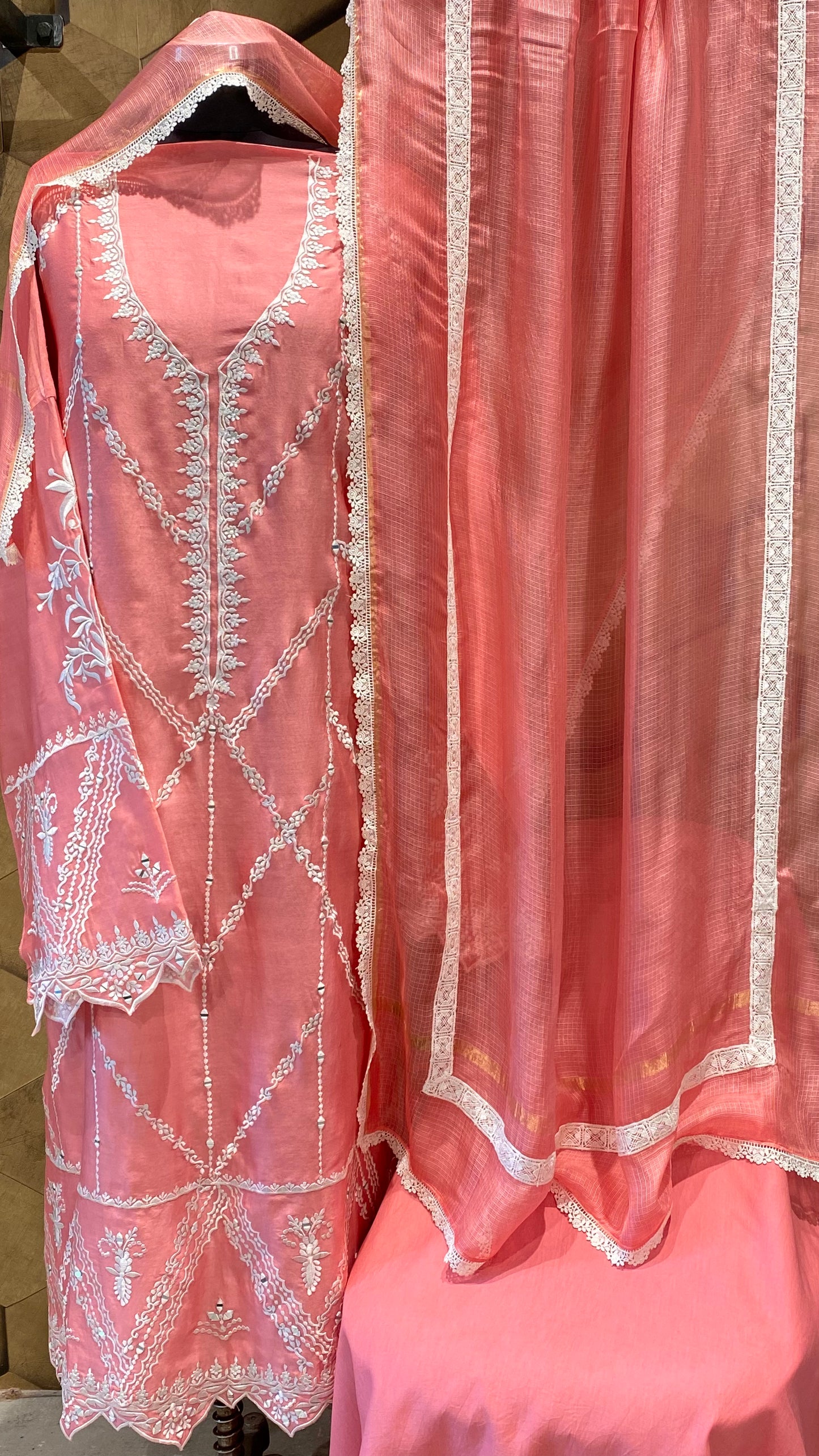 An elegant peach chanderi shirt teamed with kota silk dupatta