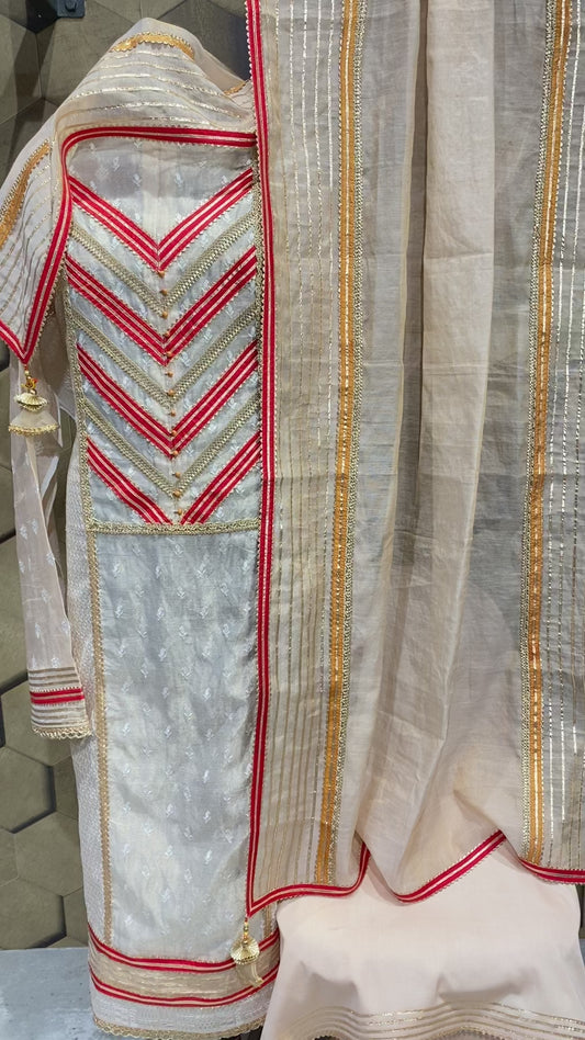 Chanderi tissue outfit with a hint of red